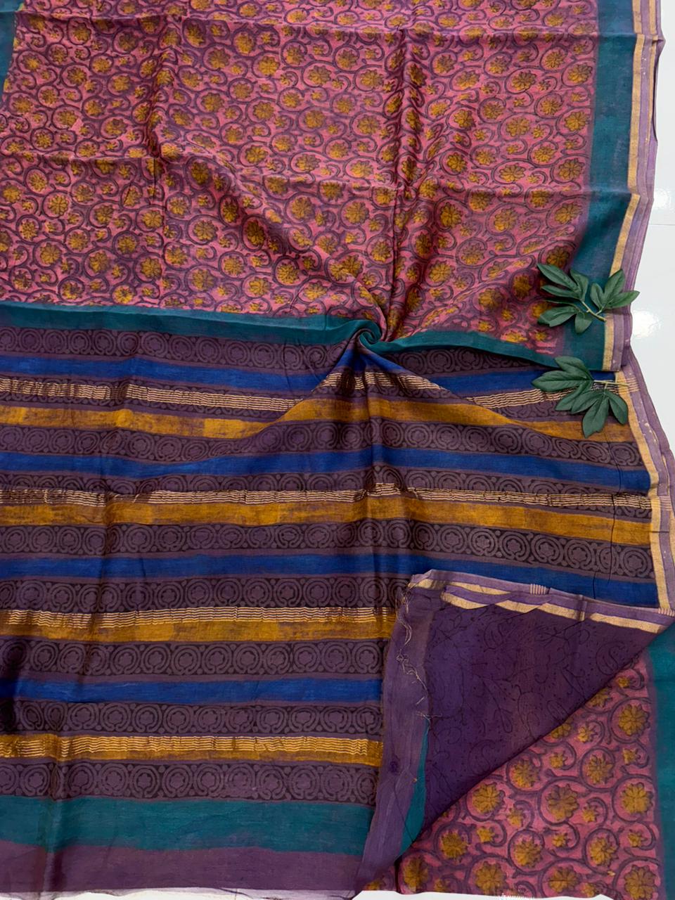 Authentic Bagru handblock print on a soft Maheshwari silk saree with intricate floral and geometric patterns.