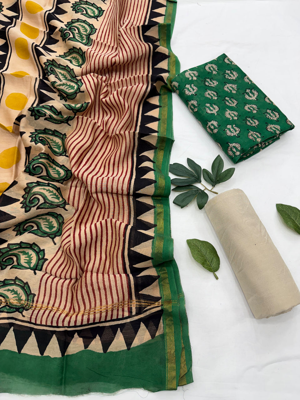 A handcrafted Chanderi silk saree featuring a beige and green striped body with intricate green paisley block-print motifs, accented by a solid green border and pallu detail.