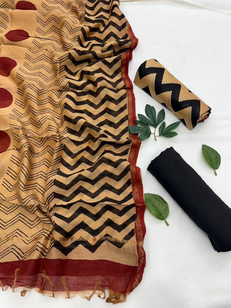 Leheriya natural Bagru hand block printed beige and black Chanderi silk suit fabric with maroon border and floral motif details