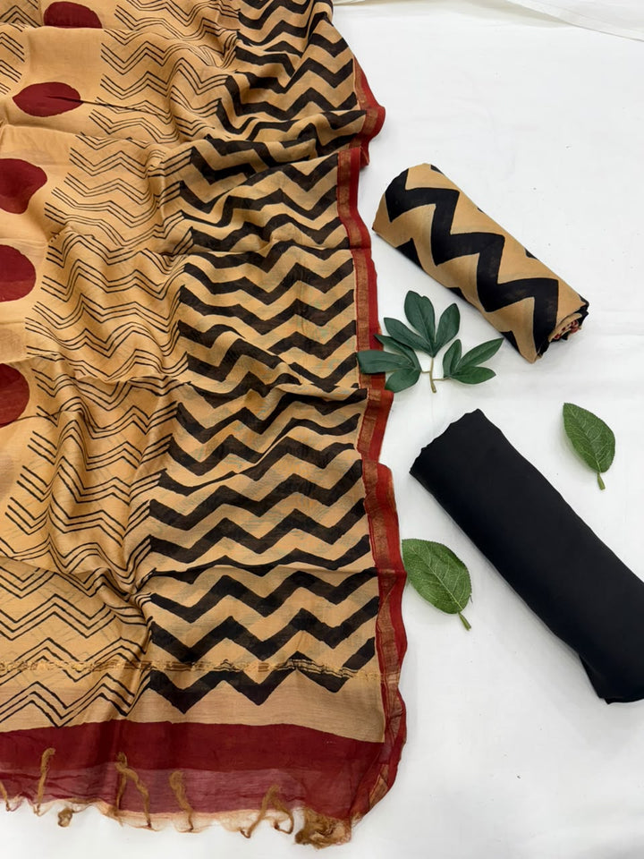 Leheriya natural Bagru hand block printed beige and black Chanderi silk suit fabric with maroon border and floral motif details