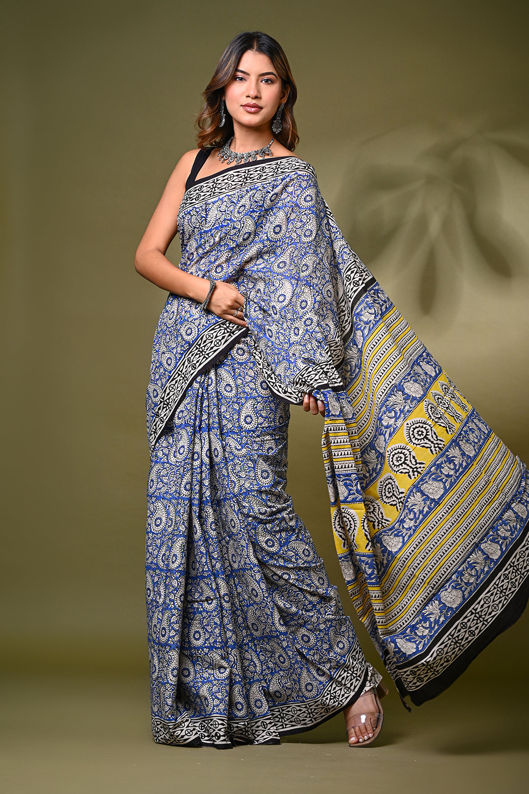 Authentic Bagru handblock printed soft mulmul cotton saree featuring blue and cream ethnic paisley patterns and natural dye details.