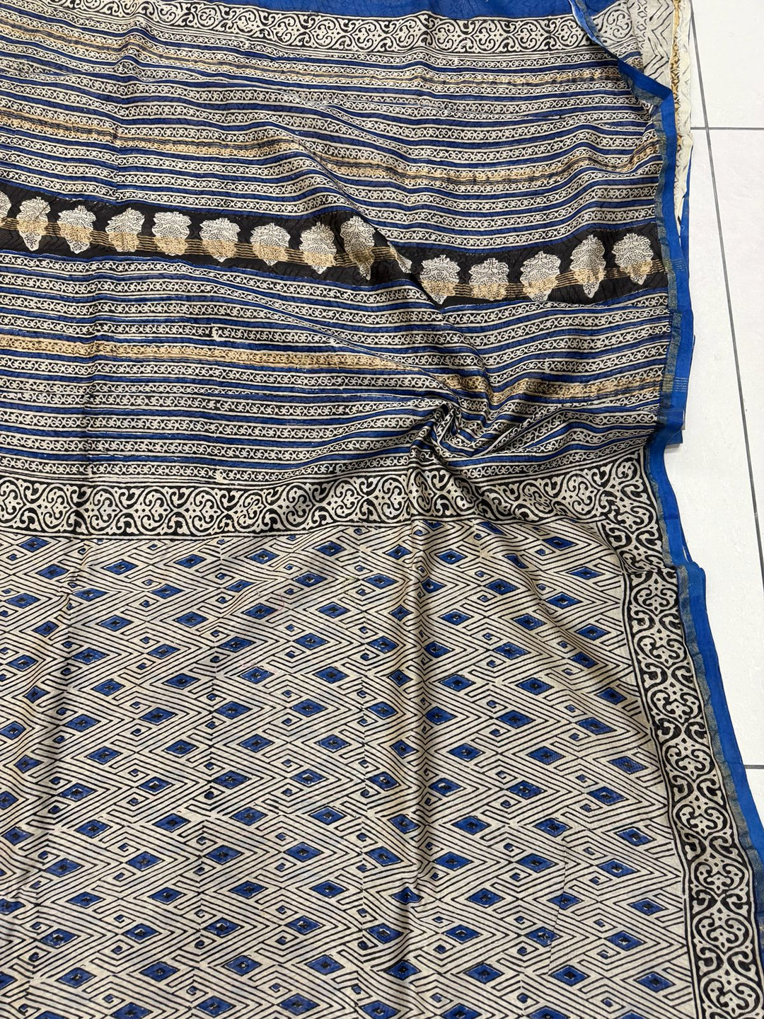 Blue and white hand block printed Chanderi Silk saree with traditional Bagru motifs.
