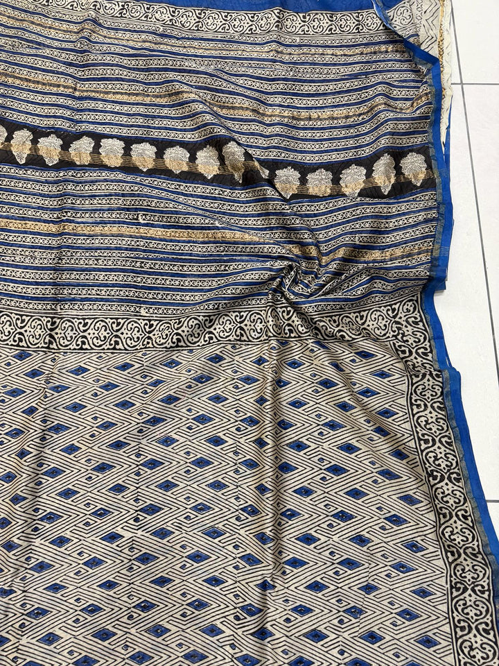 Blue and white hand block printed Chanderi Silk saree with traditional Bagru motifs.