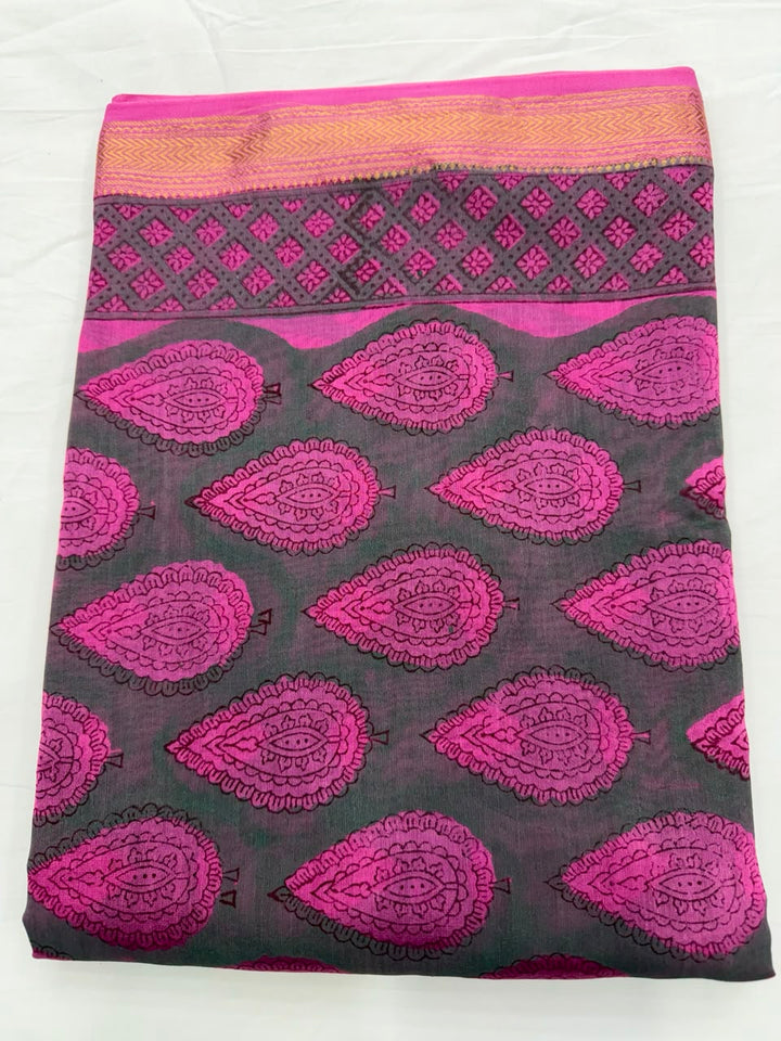 Close-up of the unstitched charcoal grey Maheshwari silk kurta fabric, featuring elegant pink and magenta traditional Bagru hand block printed leaf motifs.