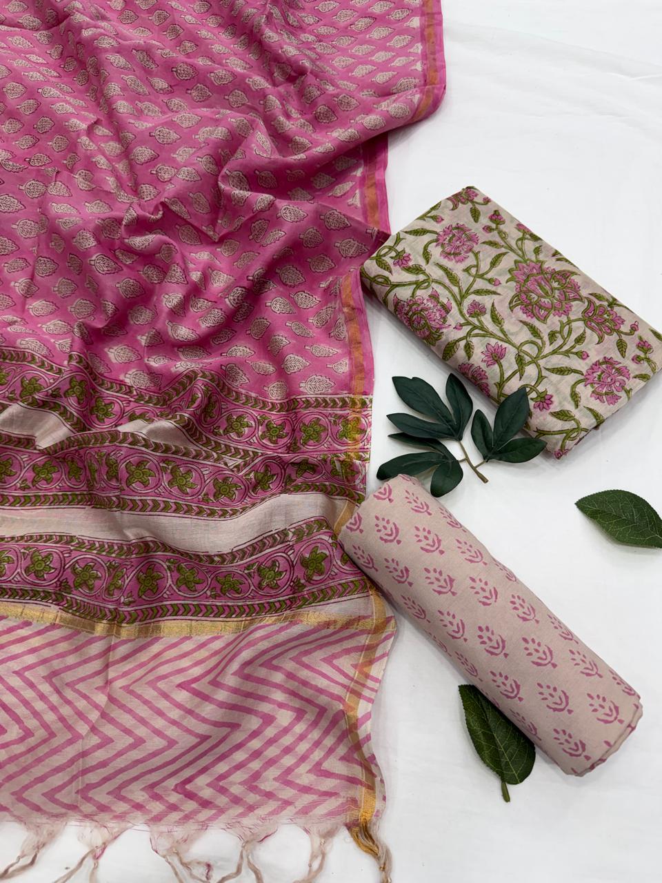Pink hand block printed pure Chanderi silk suit set with floral dupatta, kurta fabric, and unstitched bottom fabric.