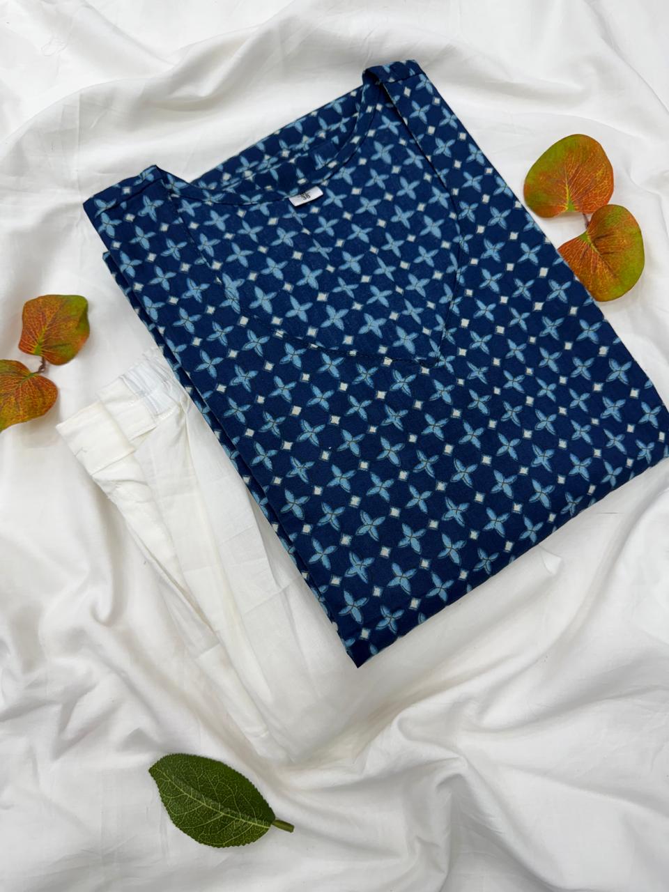 The complete ethnic co-ord set featuring the Indigo Blue Bagru printed tunic and matching white cotton trousers displayed together.