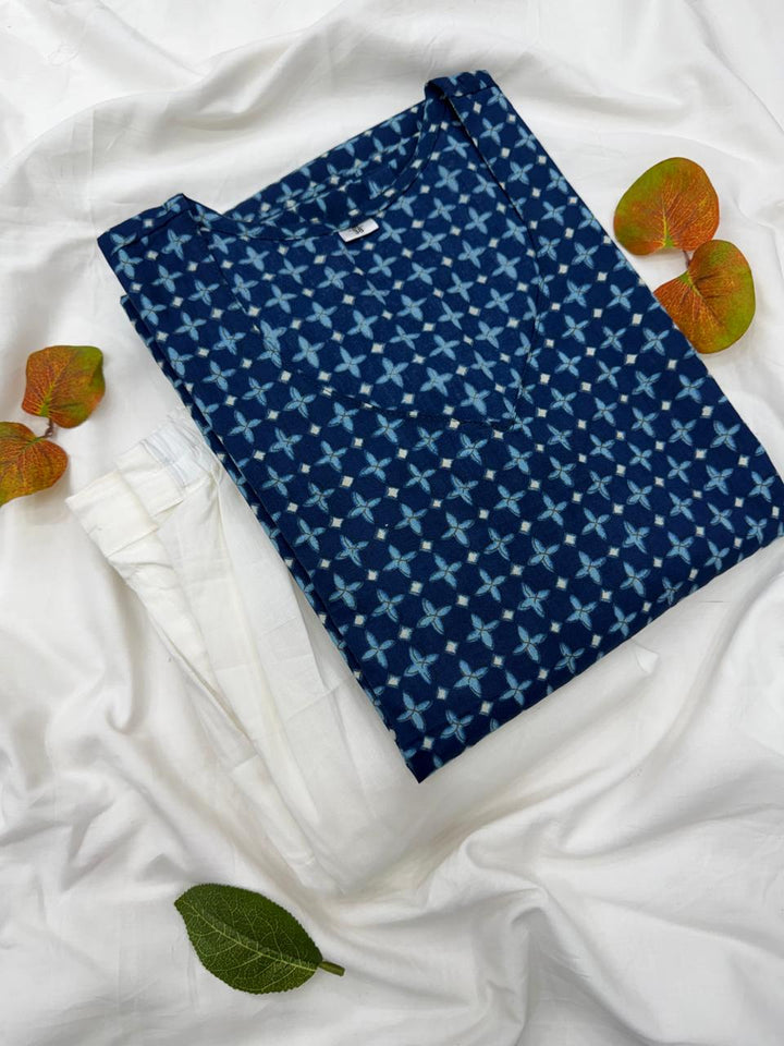 The complete ethnic co-ord set featuring the Indigo Blue Bagru printed tunic and matching white cotton trousers displayed together.