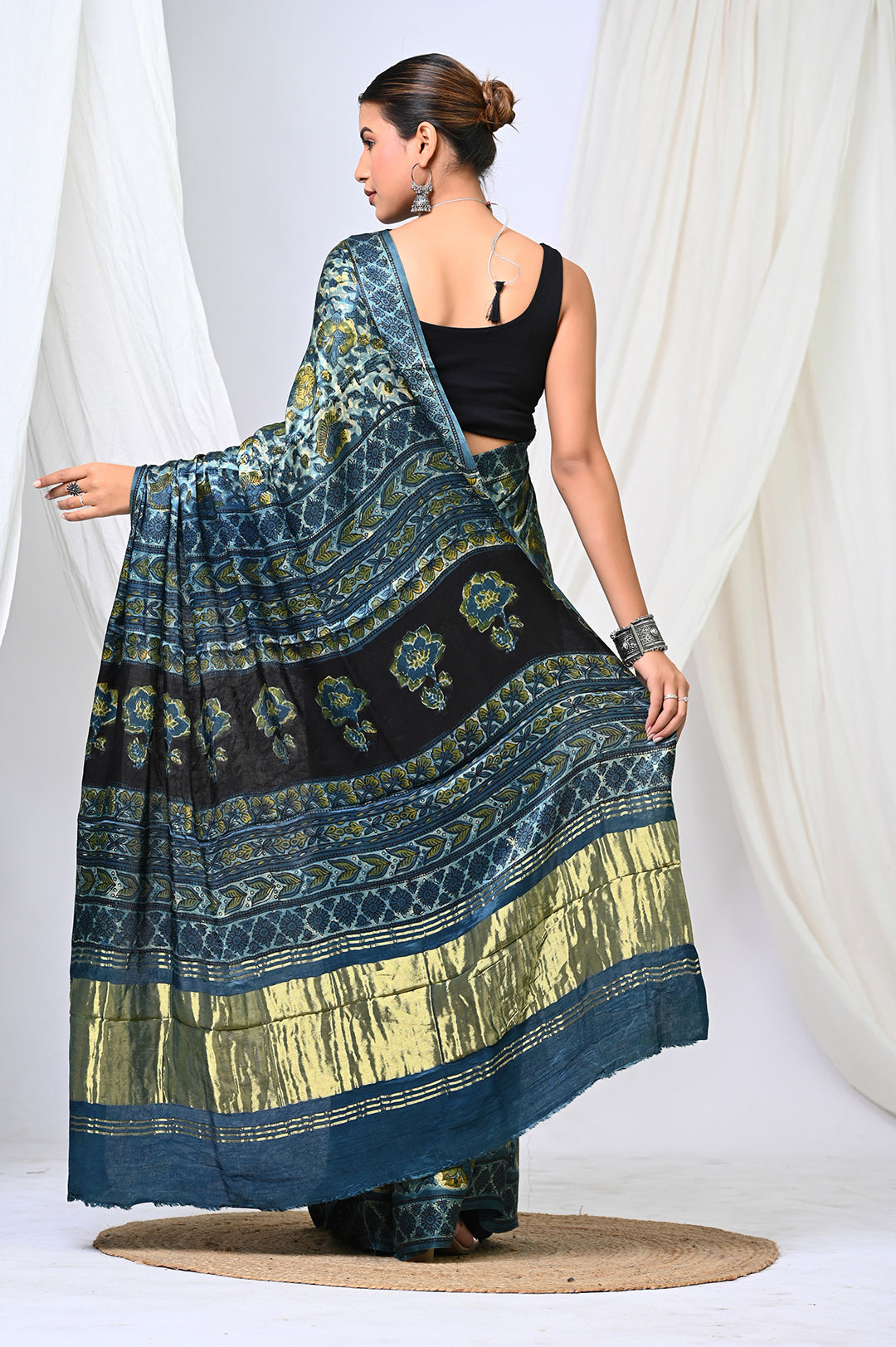 Premium natural indigo dyed Ajrakh Modal Silk saree with a subtle sheen, perfect for luxury festive and wedding wear.