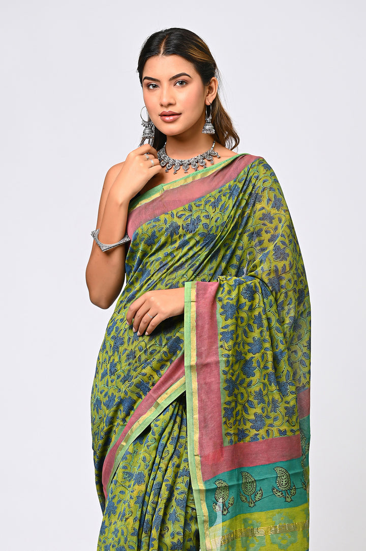 Full-length view of a premium pure Chanderi silk saree handcrafted with plant-based botanical dyes from pomegranate rind, highlighting its sheer texture and traditional hand block printed motifs.