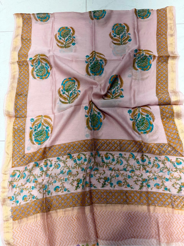 Detailed view of the pink handloom Maheshwari silk dupatta, highlighting the intricate Sanganeri geometric and floral patterns with a rich golden Zari border.