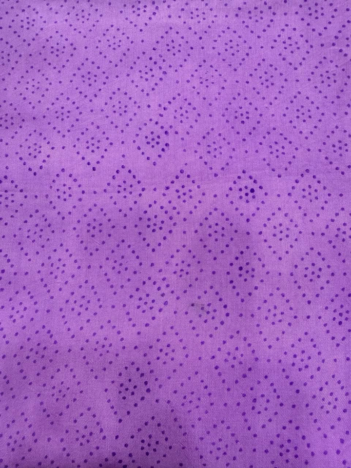 Premium quality solid royal purple unstitched Santoon silk bottom fabric, neatly rolled for the Sanganeri Jaal print Maheshwari silk suit set.