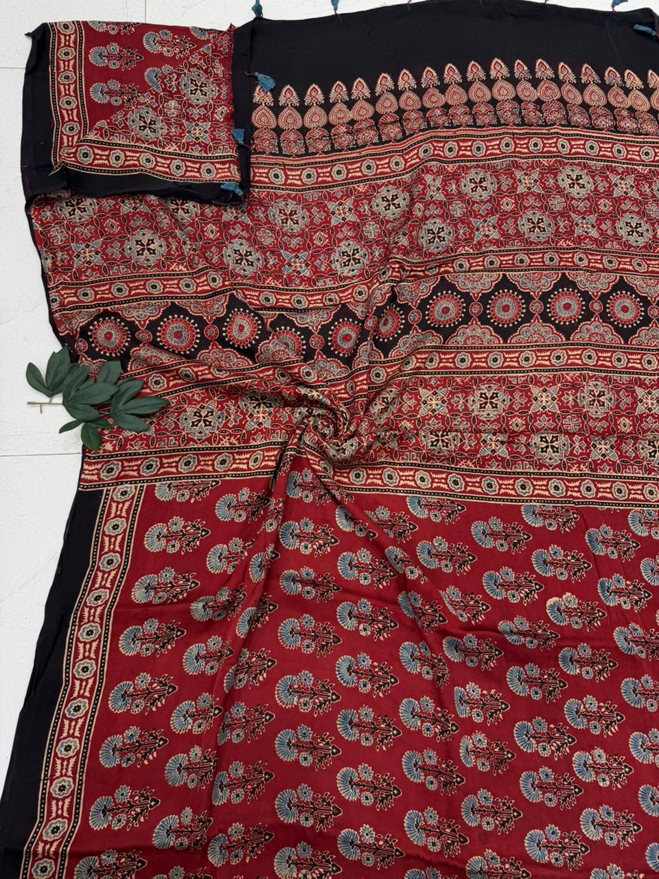 red and black natural dye hand block print ajrakh modal silk saree .