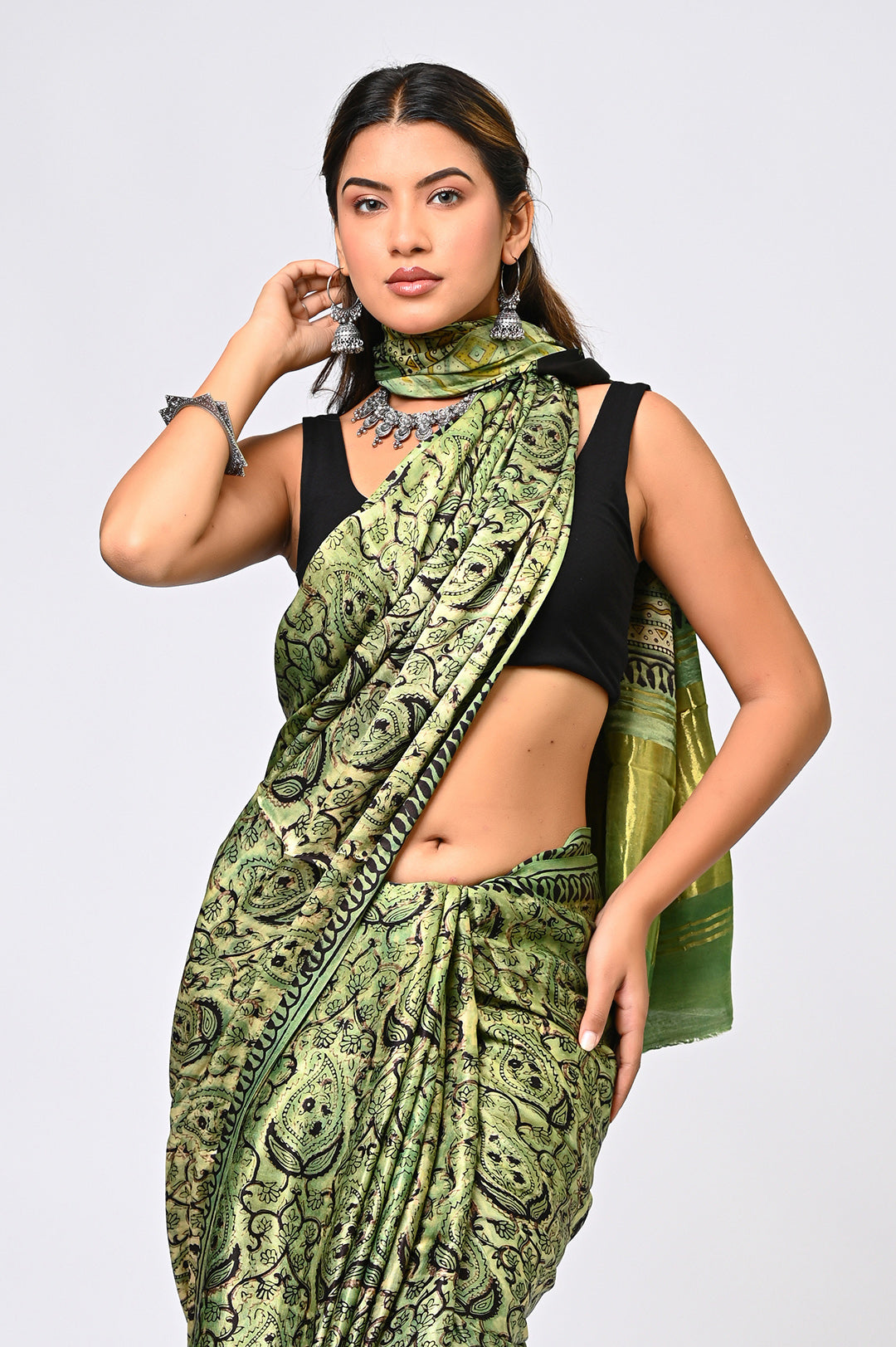 Organic natural green modal silk saree featuring traditional Vanaspati herbal block print and Lagdi Patta geometric border design.